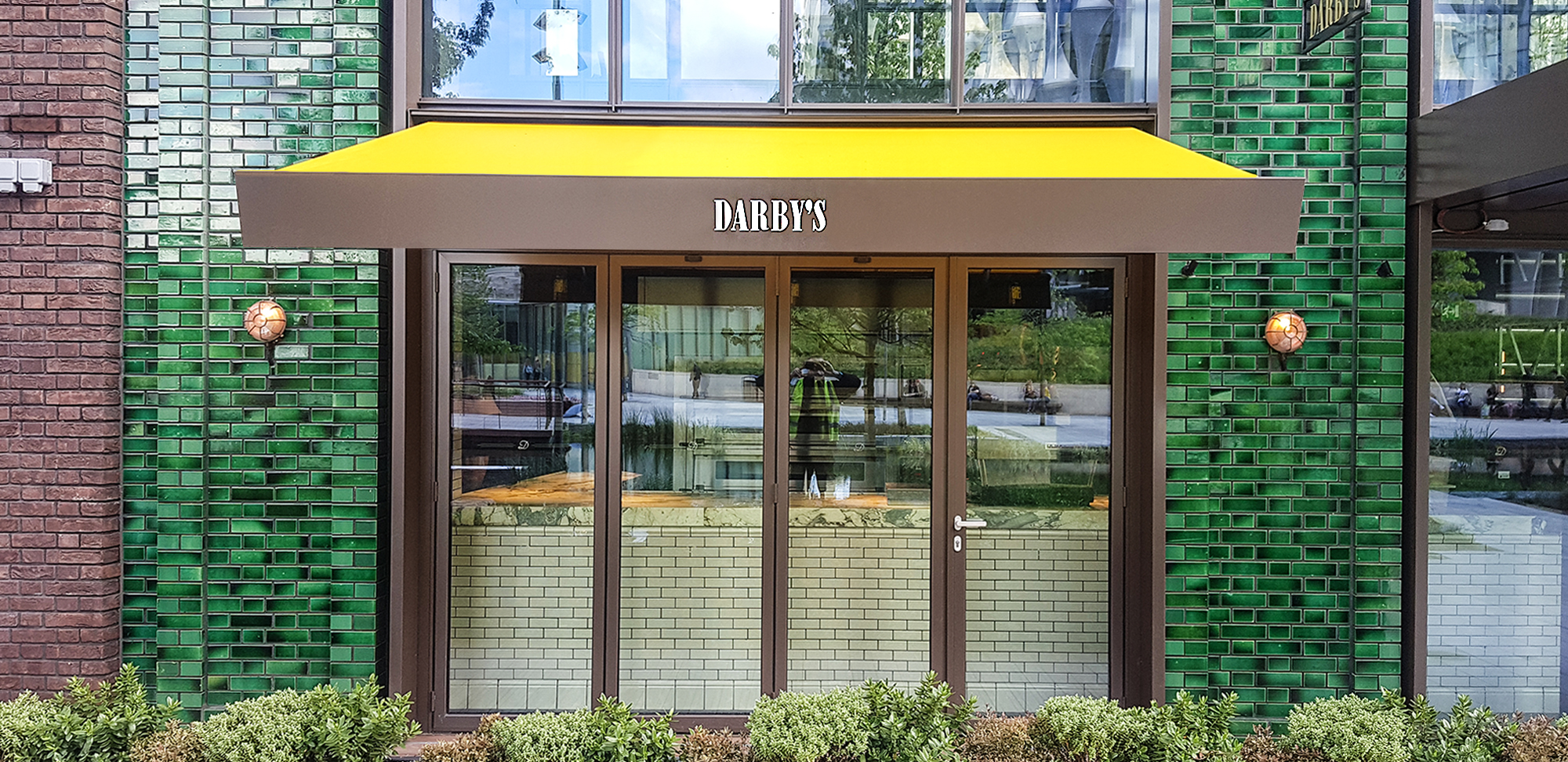 SQ2 awnings with bespoke encasement for Darby’s at Embassy Gardens, London.