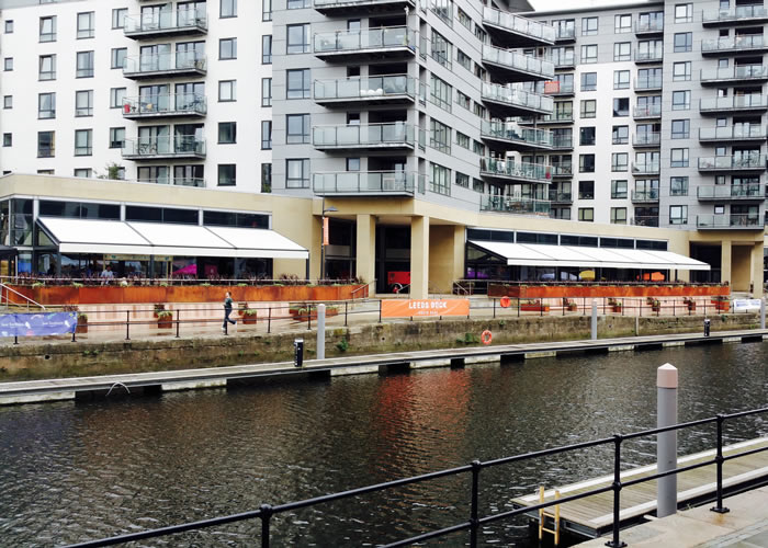 Bellfort Awning® terrace awnings with Rib Panel® bar and restaurant canopies for Leeds Dock urban regeneration project